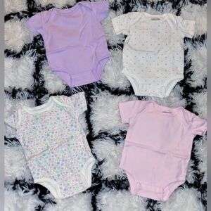 Kirkland Infant Girl Set of 4 Onesies New only washed never worn.